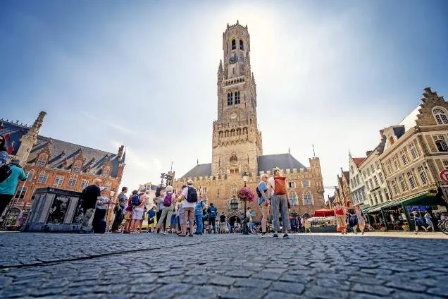 the Markt with the Belfry seen from the cobbles